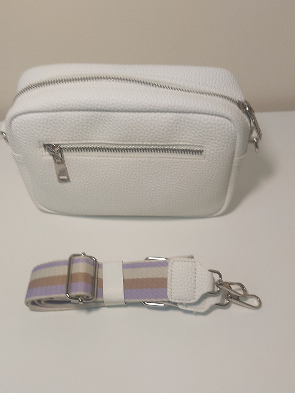 White Pebbled Leather Crossbody Bag with Removable Striped Strap